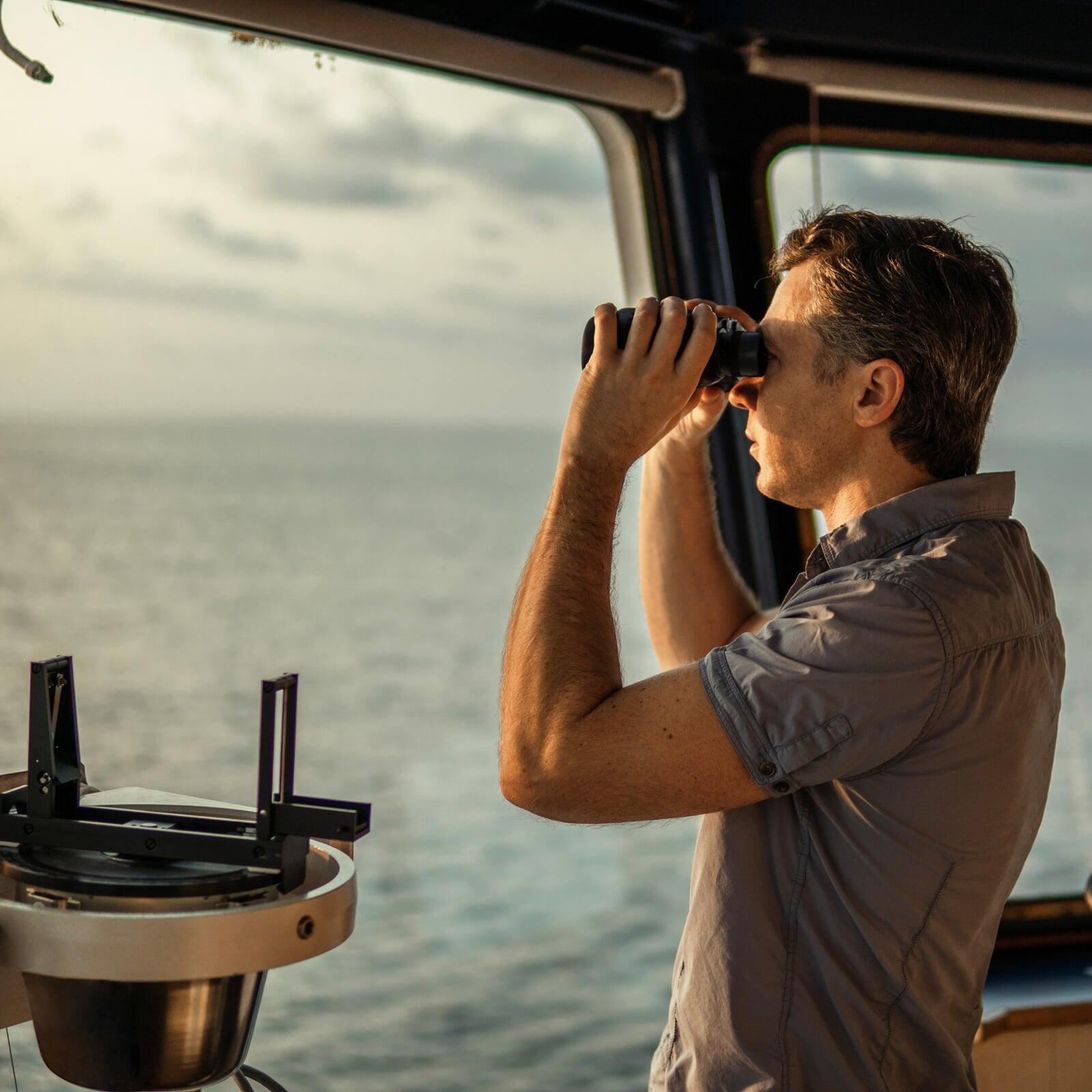 Ship's captain looking out to the future to identify target location.
